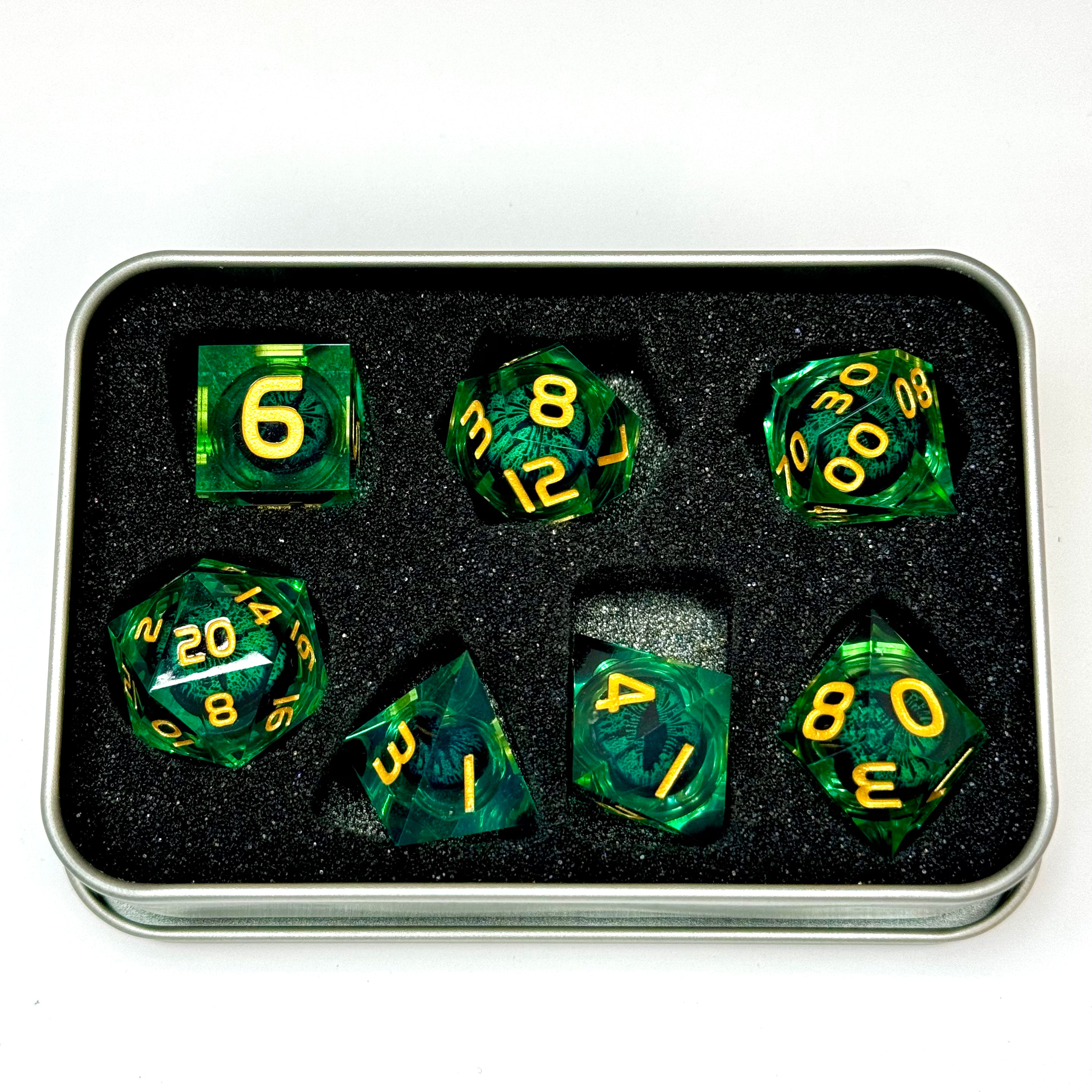 Ensemble de 7 dés à œil à noyau liquide en résine - Émeraude