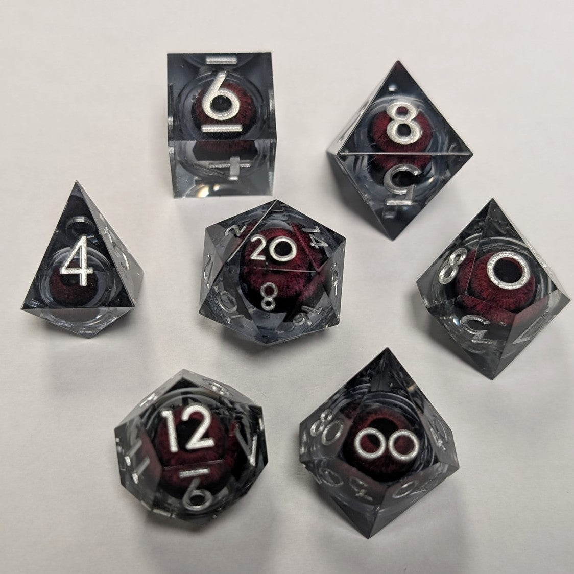 Resin Liquid Core Eye 7 Dice Set - Grey/Red